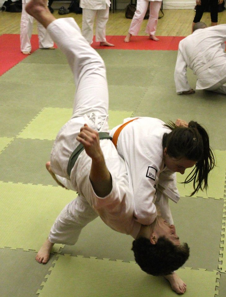 Student throwing their opponent with Tai Otoshi (body drop)