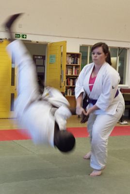 A student throwing their opponent with Kote Gaeshi (wrist twist)